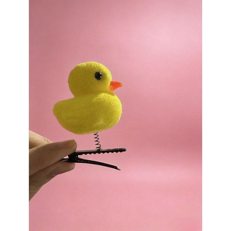 A cute cartoon yellow duckling - Photography Yellow avis et prix